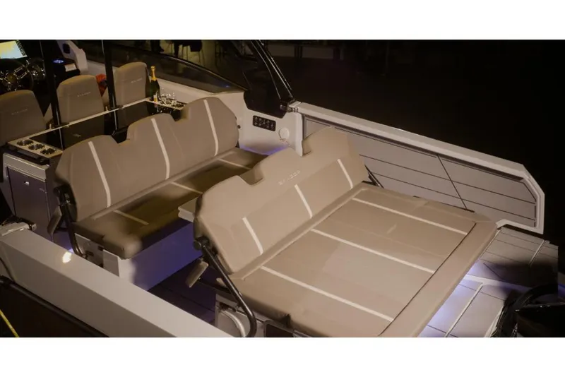 Slide: The Image of 2024 Saxdor 320 GTO boat interior with beige seating and modern design. - 29