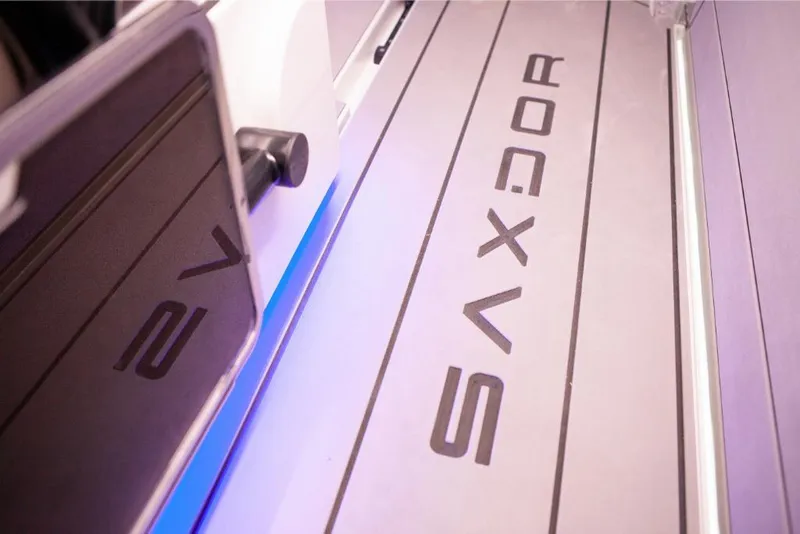 Slide: The Image of Close-up of 2024 Saxdor 320 GTO deck with logo. - 32