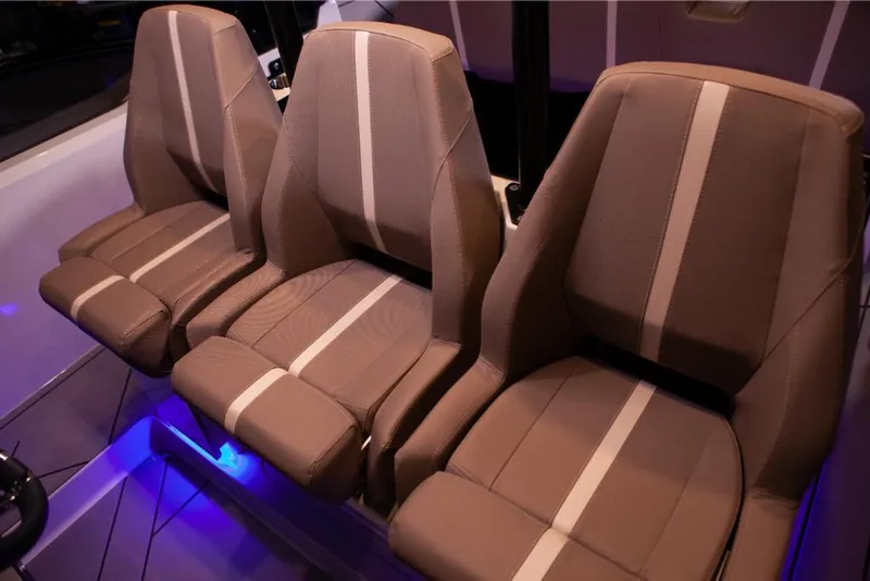 Slide: The Image of Three comfortable seats in the 2024 Saxdor 320 GTO boat interior. - 36
