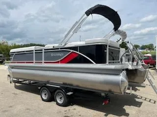 Slide: The Image of 2024 Godfrey Sweetwater 2286 pontoon boat on a trailer. - 1