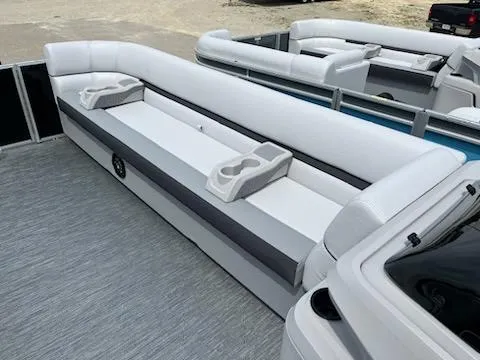 Slide: The Image of 2024 Godfrey Sweetwater 2286 pontoon boat with spacious seating and cup holders. - 8