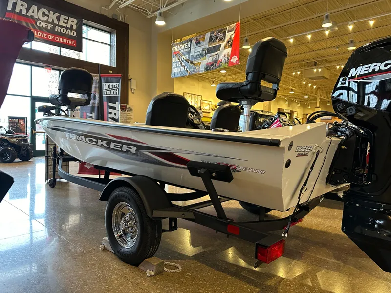 Slide: The Image of 2024 Tracker Pro Team 175 TF fishing boat on display in showroom. - 4