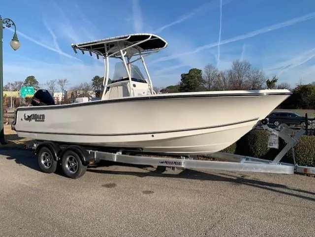 The Image of 2024 Mako 214 CC center console boat on a trailer. - 0