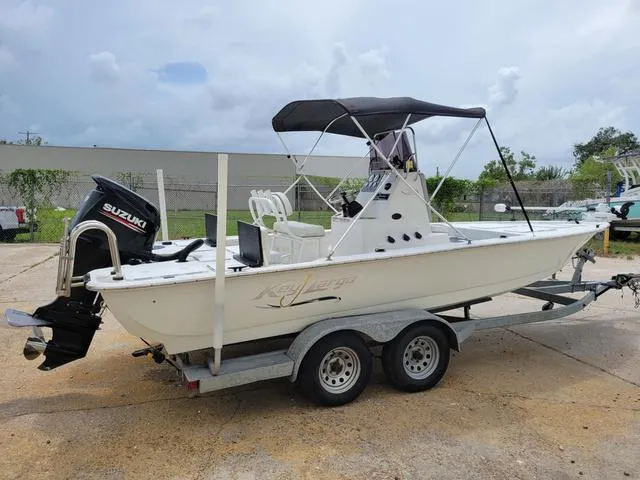 Slide: The Image of 2019 Key Largo 220 BAY boat on trailer with Suzuki outboard motor. - 7