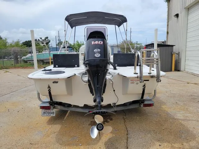 Slide: The Image of 2019 Key Largo 220 BAY boat with 140 HP engine, rear view. - 8