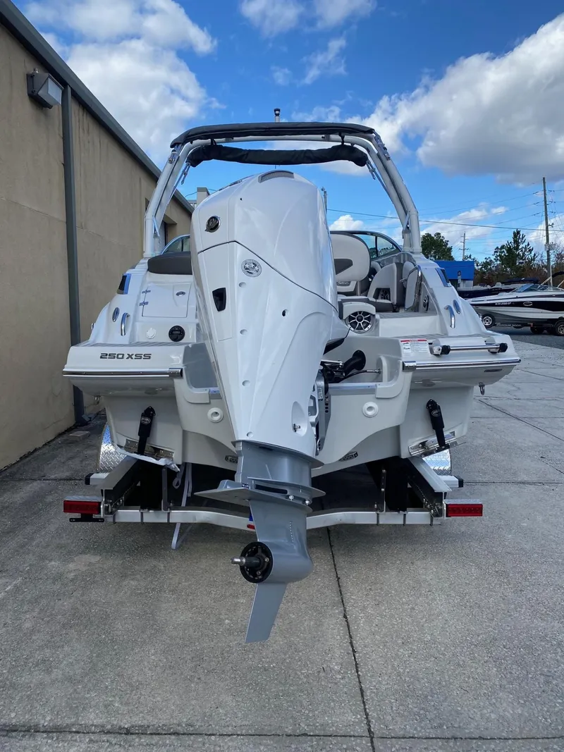 Slide: The Image of 2024 Crownline 250 XSS boat on trailer, rear view. - 4