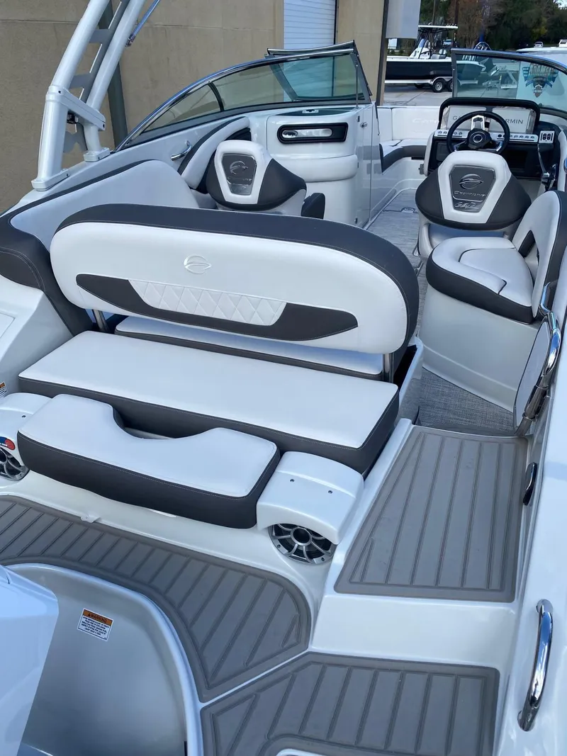 Slide: The Image of 2024 Crownline 250 XSS boat interior with luxurious seating and modern design. - 5