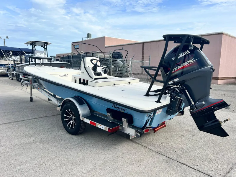 Slide: The Image of 2024 Maverick 18 HPX-V boat with Yamaha outboard motor on trailer. - 11