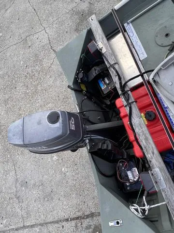 Slide: The Image of 2020 Southfork 1552 boat with outboard motor and red fuel tank. - 5