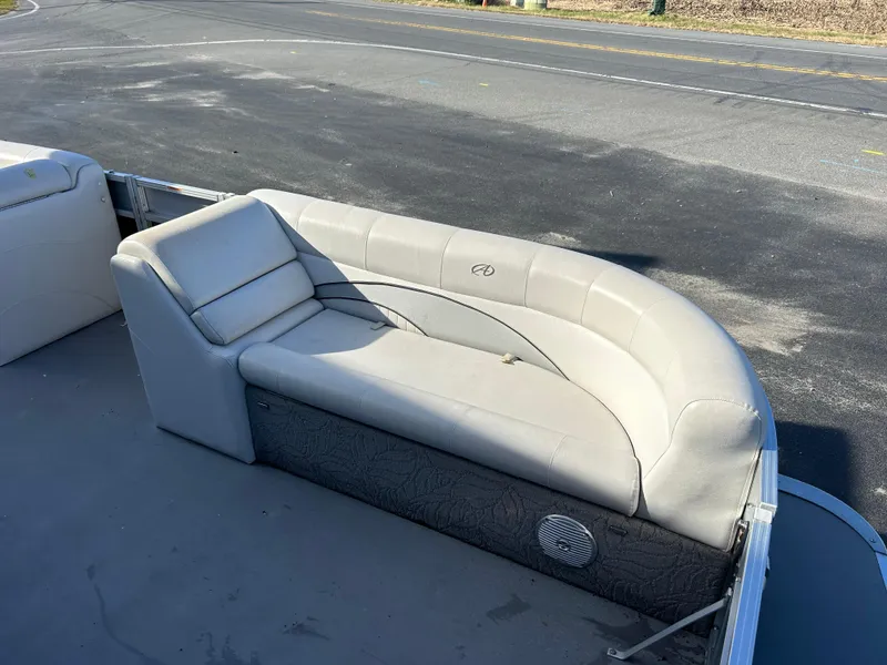 Slide: The Image of 2014 Avalon 2285 Catalina Cruise Twin Toon boat with beige seating. - 7