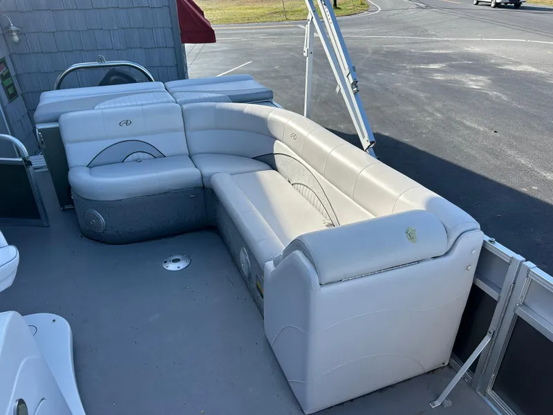 Slide: The Image of 2014 Avalon 2285 Catalina Cruise Twin Toon boat with white leather seating. - 8