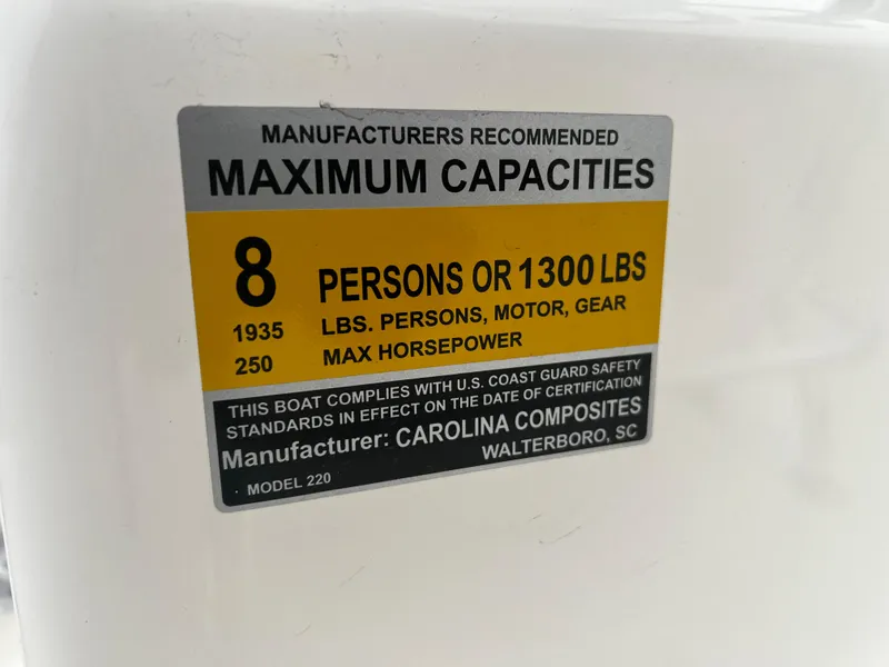 Slide: The Image of 2024 Pioneer 220 Bay Sport capacity label, 8 persons or 1300 lbs, 250 max horsepower. - 27