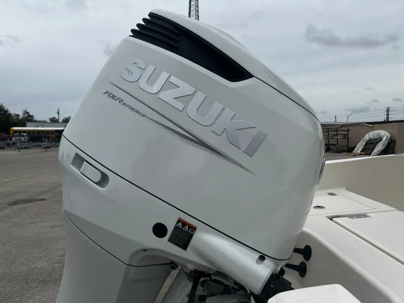 Slide: The Image of Suzuki outboard motor on 2024 Pioneer 220 Bay Sport boat. - 38
