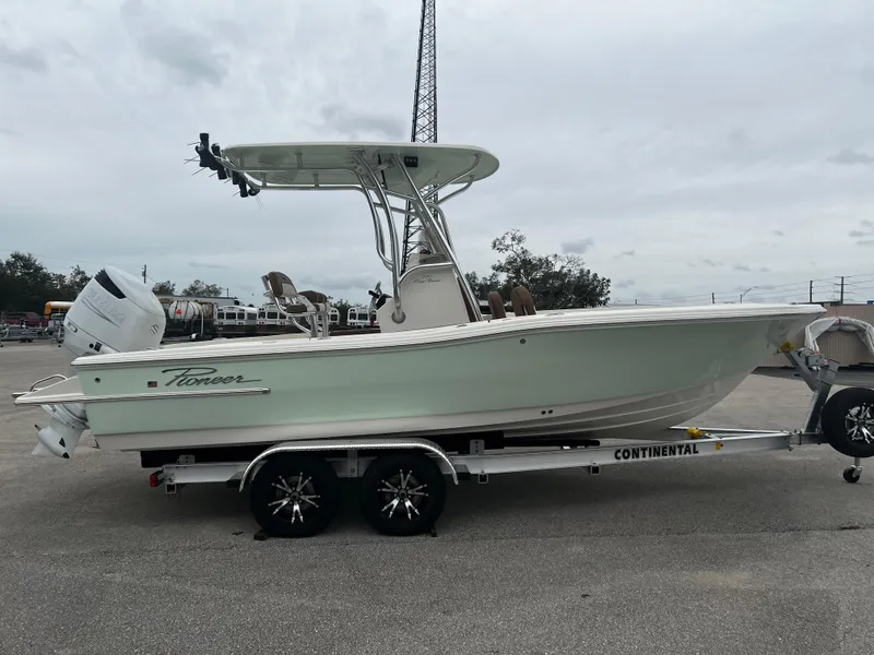 Slide: The Image of 2024 Pioneer 220 Bay Sport boat on trailer, side view. - 7