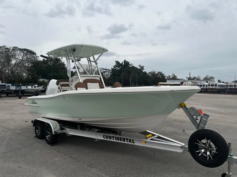 Slide: The Image of 2024 Pioneer 220 Bay Sport boat on trailer in parking lot. - 8