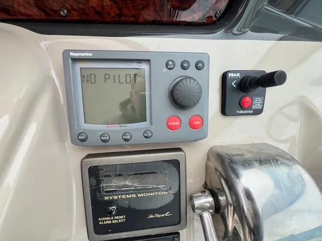 Slide: The Image of Control panel of a 2005 Sea Ray 500 Sundancer with Raymarine display showing "No Pilot". - 14