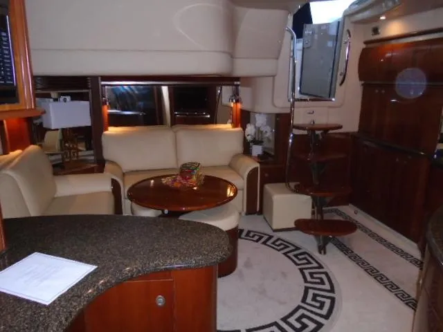 Slide: The Image of Luxurious interior of 2005 Sea Ray 500 Sundancer yacht with elegant seating and decor. - 30
