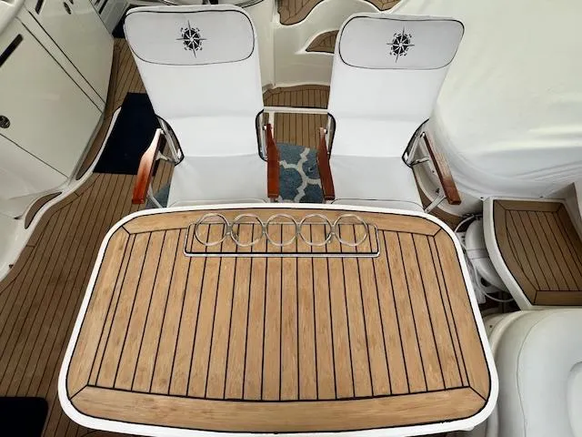 Slide: The Image of Luxury seating and table on 2005 Sea Ray 500 Sundancer yacht deck. - 38