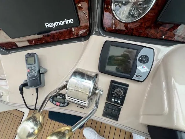 Slide: The Image of Control panel of 2005 Sea Ray 500 Sundancer with Raymarine navigation system. - 40