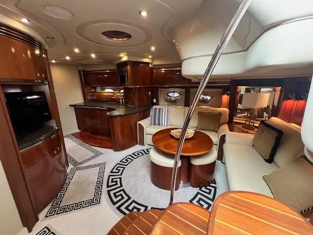 Slide: The Image of Luxurious interior of a 2005 Sea Ray 500 Sundancer yacht with elegant wood finishes. - 45