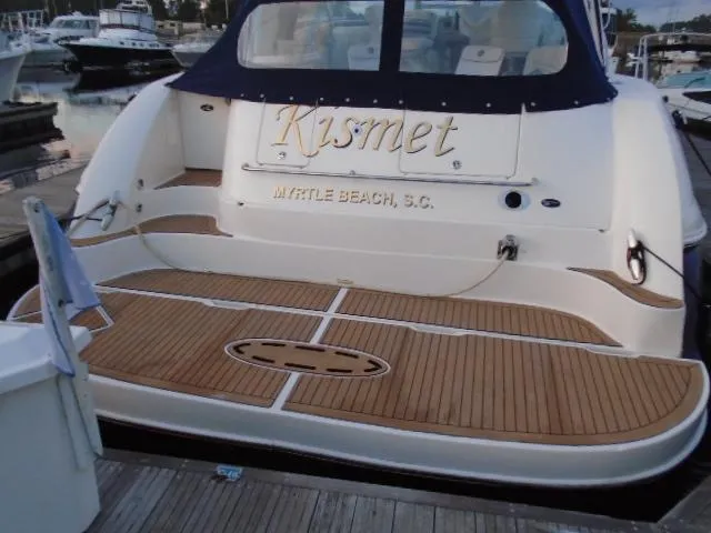 Slide: The Image of 2005 Sea Ray 500 Sundancer yacht docked, featuring teak swim platform and Myrtle Beach, S.C. location. - 7