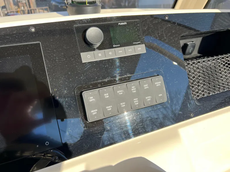 Slide: The Image of 2024 Scout 215 XSF dashboard with control panel and display. - 20