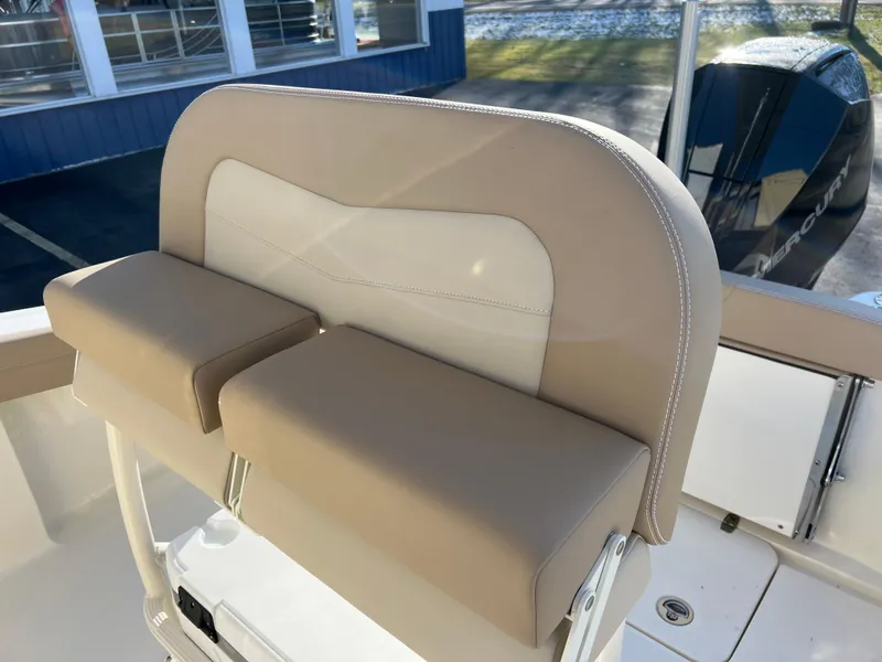 Slide: The Image of 2024 Scout 215 XSF boat seat with beige and white upholstery. - 24
