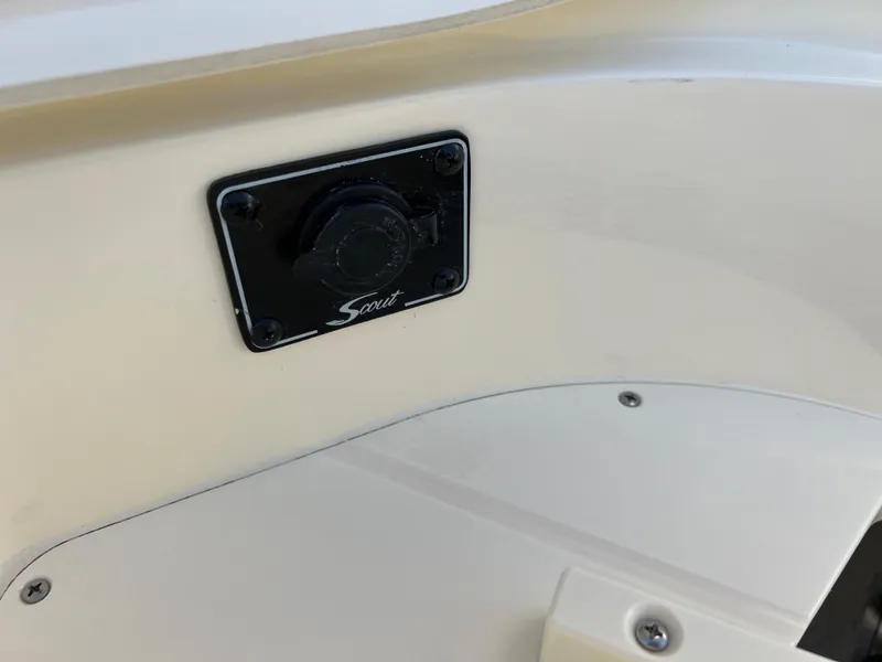 Slide: The Image of 2024 Scout 215 XSF boat detail with branded panel. - 37