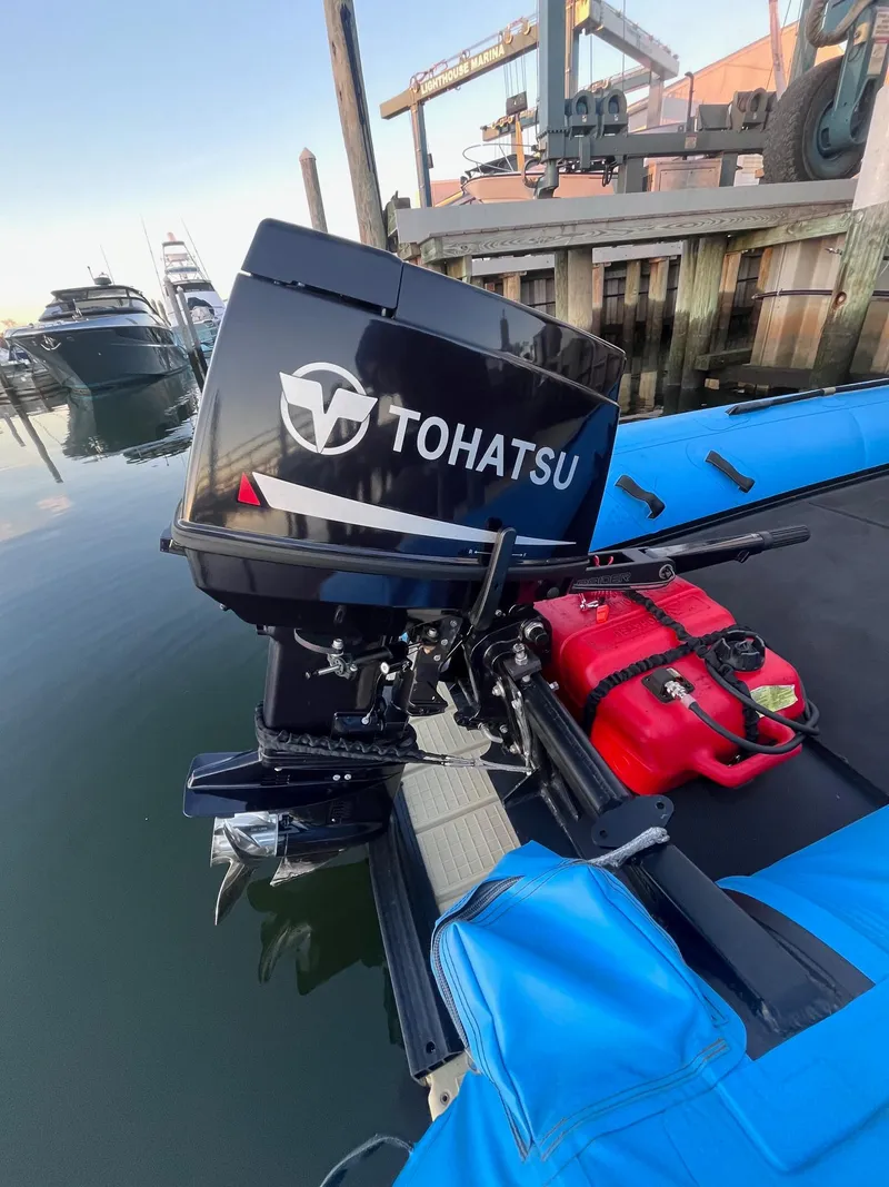 Slide: The Image of Tohatsu outboard motor on 2018 Infanta P1 PENCIL boat docked at marina. - 3