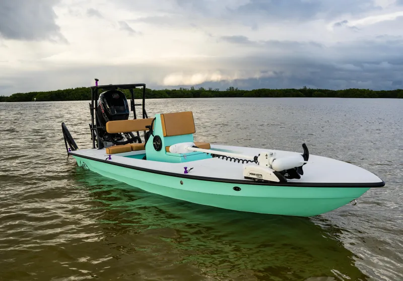 The Image of 2024 Cayo Boatworks 180 in mint green on calm water. - 0