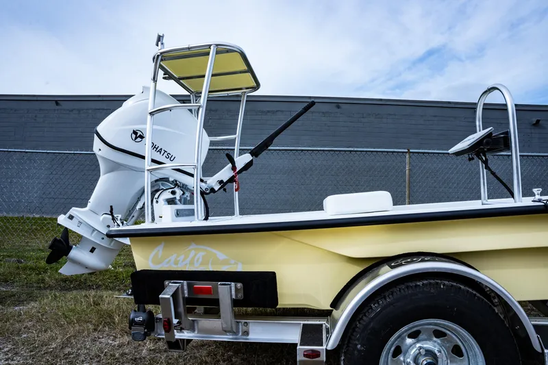 Slide: The Image of 2024 Cayo Boatworks 173 with Tohatsu outboard motor on trailer. - 13
