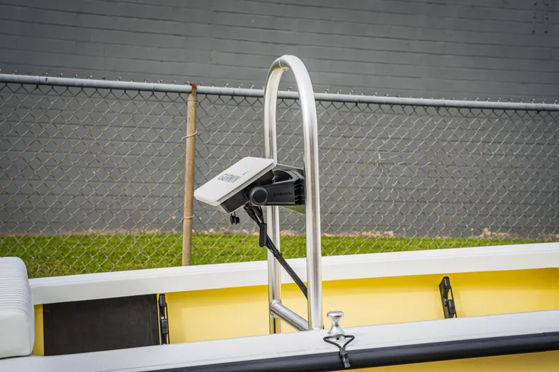 Slide: The Image of 2024 Cayo Boatworks 173 with mounted electronic device and yellow interior. - 15