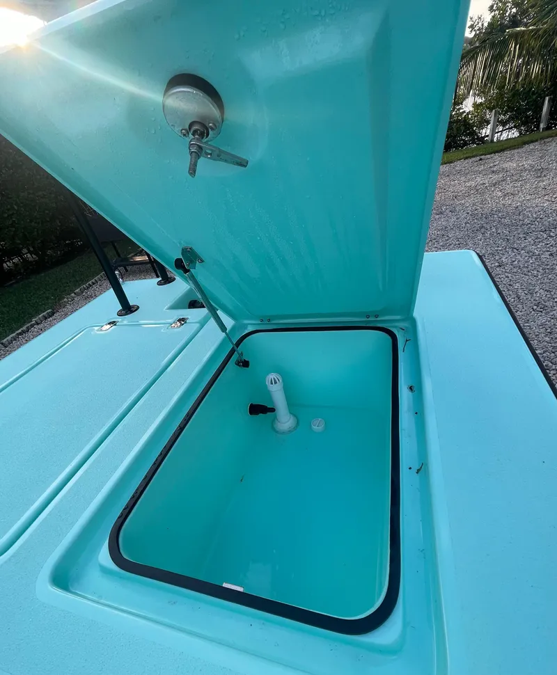 Slide: The Image of 2024 Cayo Boatworks 173 open storage compartment. - 30