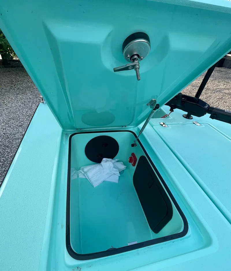 Slide: The Image of Open storage compartment of 2024 Cayo Boatworks 173 boat. - 31