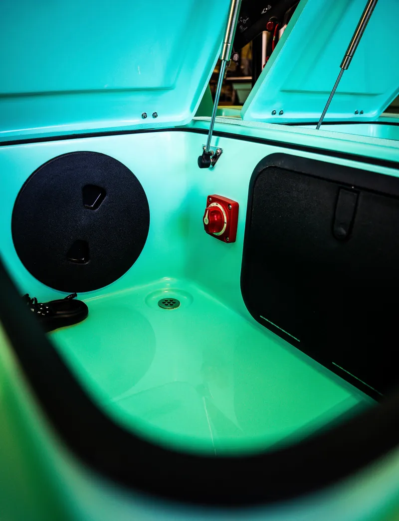 Slide: The Image of 2024 Cayo Boatworks 173 storage compartment with open hatch. - 33