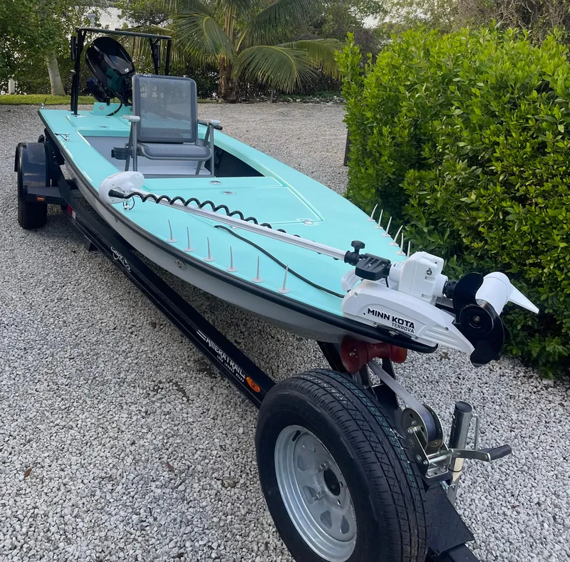 Slide: The Image of 2024 Cayo Boatworks 173 on trailer with Minn Kota trolling motor. - 43