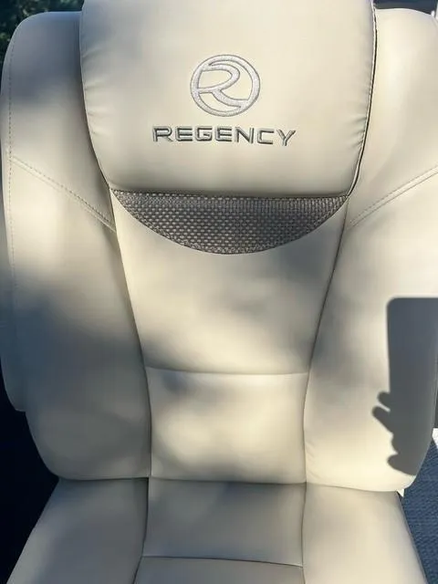 Slide: The Image of 2024 Regency 250 LE3 boat seat with logo embroidery. - 13