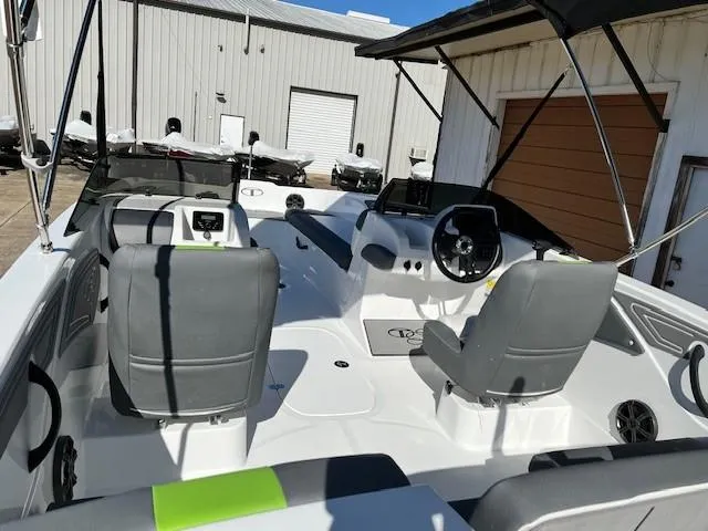Slide: The Image of 2024 Tahoe T21 boat interior with gray seats and modern dashboard. - 3