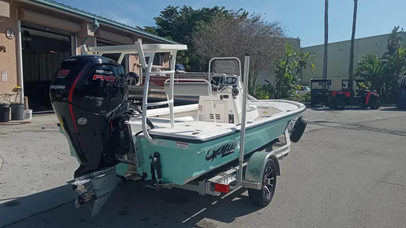 Slide: The Image of 2022 Mako 18 LTS boat with Mercury Pro XS outboard motor on trailer. - 3