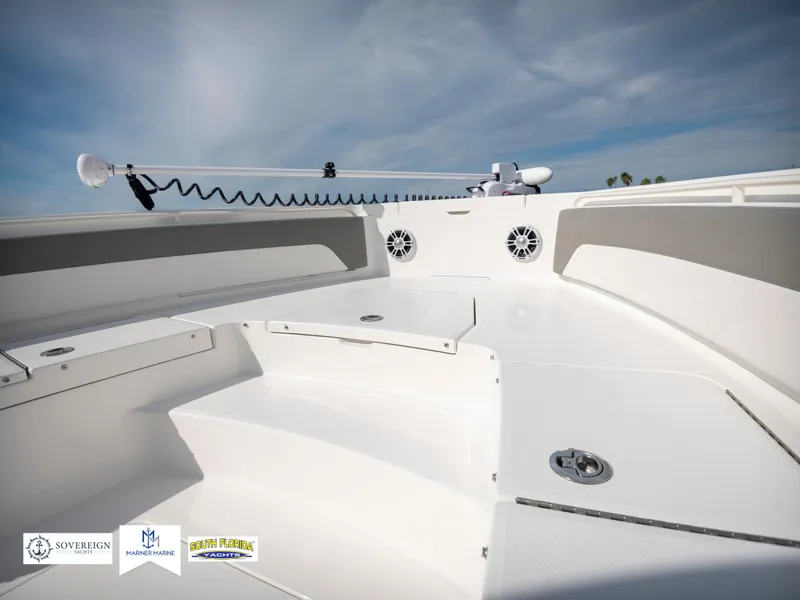 Slide: The Image of 2024 Regulator 30XO boat deck with modern design and built-in speakers. - 11