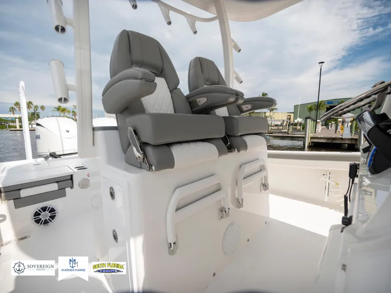 Slide: The Image of 2024 Regulator 30XO boat interior with plush seating and modern design. - 26