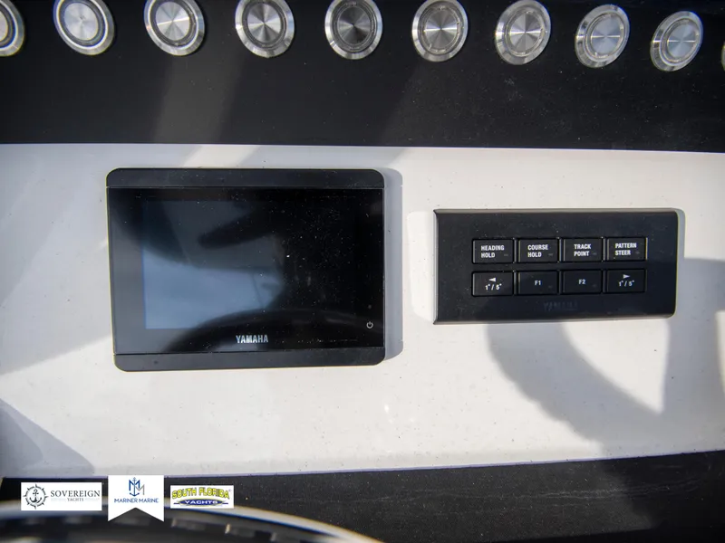 Slide: The Image of 2024 Regulator 31 dashboard with Yamaha display and control panel. - 29