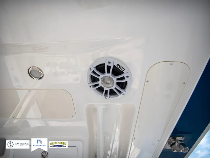 Slide: The Image of 2024 Regulator 31 boat interior with speaker and control panel. - 32