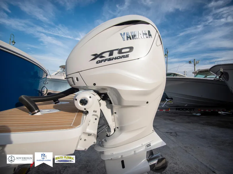 Slide: The Image of 2024 Regulator 31 boat with Yamaha XTO Offshore outboard motor. - 8