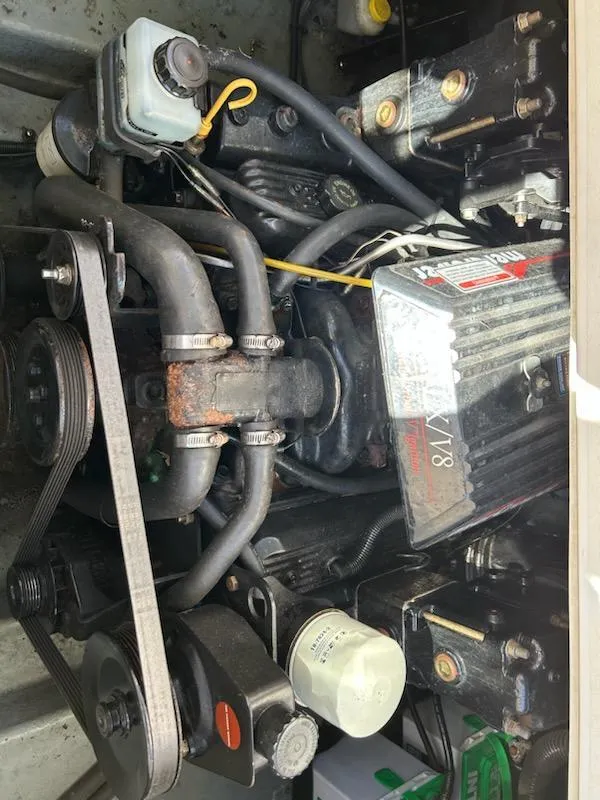 Slide: The Image of Engine compartment of a 1997 Sea Ray Sundancer boat. - 10