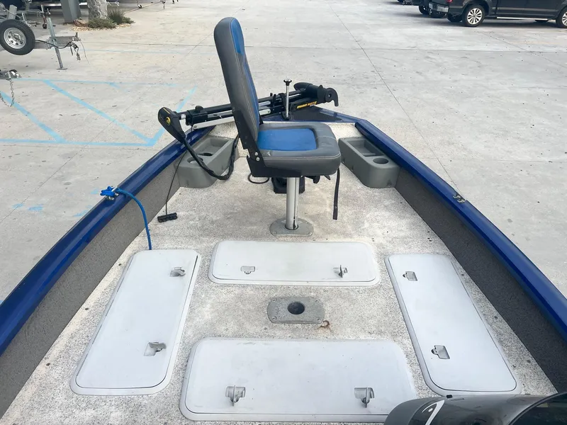 Slide: The Image of 2013 Tracker Pro Team 175 TF fishing boat deck with seat and storage compartments. - 10