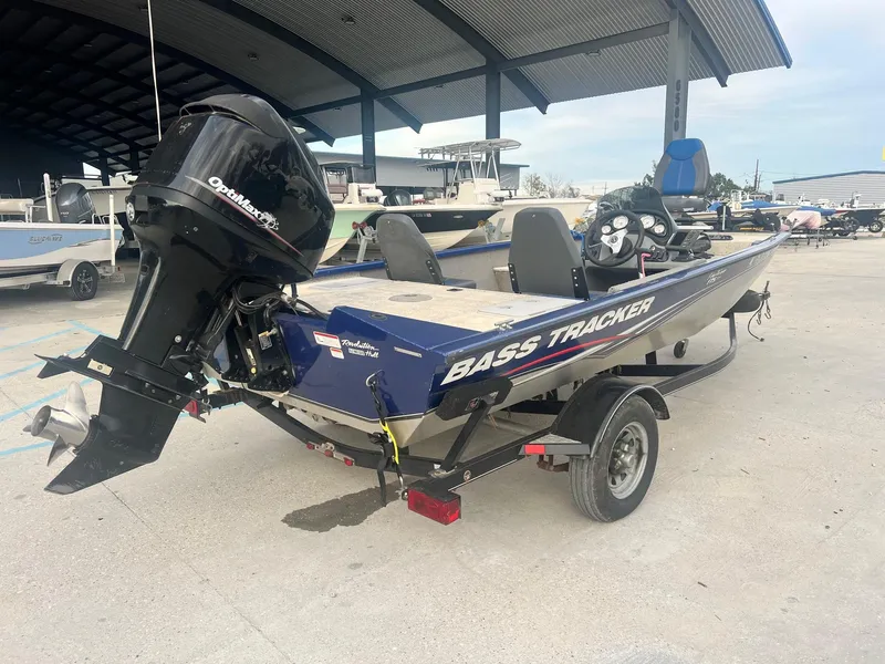 Slide: The Image of 2013 Tracker Pro Team 175 TF Bass Tracker boat on trailer, rear view. - 2