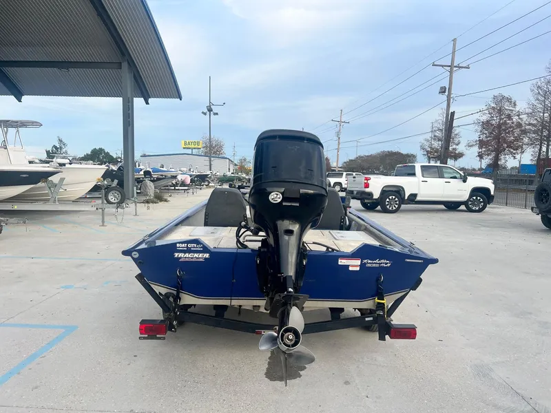 Slide: The Image of 2013 Tracker Pro Team 175 TF boat, rear view, parked on a trailer. - 3