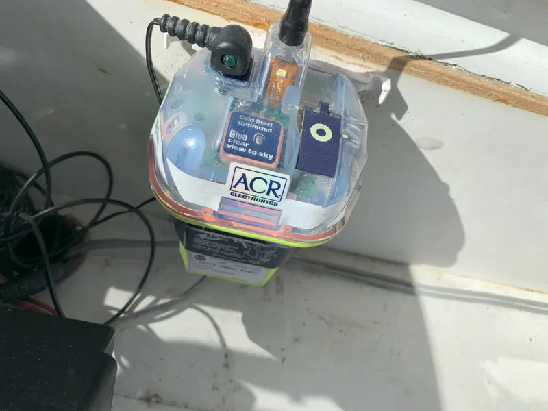 Slide: The Image of ACR Electronics device on a 1986 Gladding Hearn Hunt Designed 60 boat. - 17