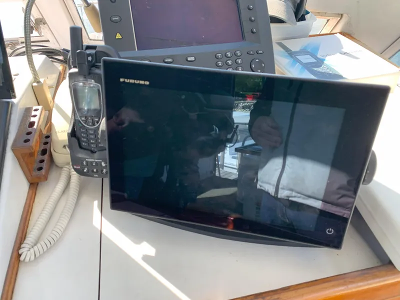 Slide: The Image of Control panel of a 1986 Gladding Hearn Hunt Designed 60 boat with Furuno electronics. - 40